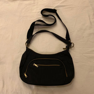 Travelon crossbody bag with 2 straps and a light!
